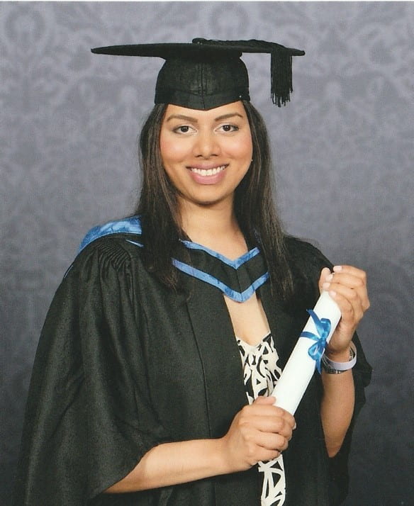 Photo of Kaleivani in her graduation outfit